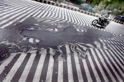 Melting road marks India